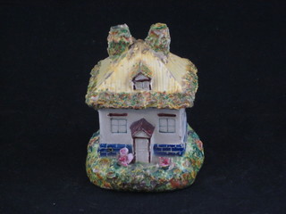 An 18th Century Staffordshire pastel burner in the form of a cottage 4"