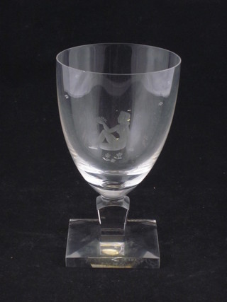 A 1930's etched glass seated naked lady, raised on a square foot marked Skal Josephine 5 1/2"