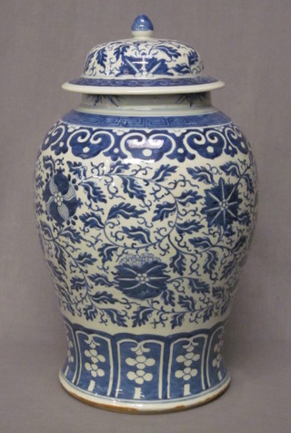 An Oriental blue and white porcelain jar and cover 17"  ILLUSTRATED