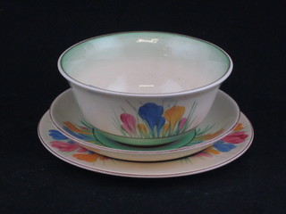 A Clarice Cliff Spring Crocus pattern sugar bowl 4", a tea plate  6 1/2" and a saucer, some contact marks to the saucer