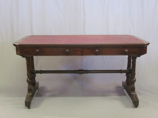 A Victorian mahogany lozenge shaped library table with inset writing surface, fitted 2 long drawers, raised on 4 turned columns  with H framed stretcher by Lambe of Manchester 53"
