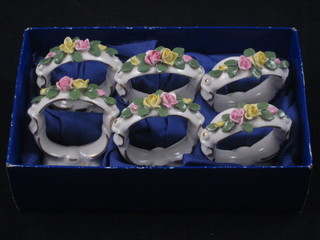 A set of 6 Dresden napkin rings