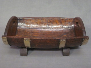 An oak coopered twin handled cutlery tray, formed from a half section of barrel 12"