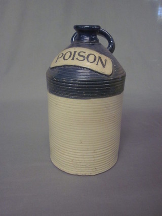 A 19th Century cylindrical ribbed pottery poison bottle