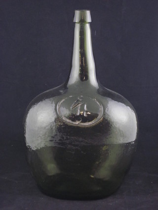 An Antique green glass club shaped bottle with seal mark neck  13"