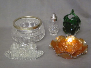 2 orange Carnival glass dishes, a green Art Glass vase, a cut  glass bowl with silver plated rim, a cut glass sugar sifter with  plated rim and a 3 piece cut glass condiment set