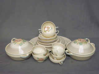 A 26 piece Susie Cooper dinner service comprising 2 circular twin handled tureens and covers 8" - 2 cracked, an oval meat  plate 14", 3 dinner plates 10", 3 side plates 8" - 2 cracked, 3 side  plates 7", 3 saucers - cracked, 3 cups - 1 cracked, 3 soup bowls & saucers & a sugar bowl