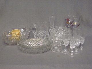 A cut glass jug, a boat shaped cut glass bowl and other items of glassware