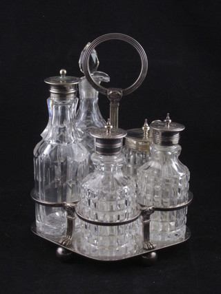 A silver plated and cut glass 5 bottle cruet