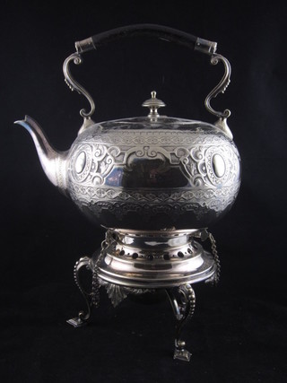 A silver plated spirit kettle complete with burner  ILLUSTRATED