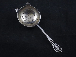 A silver tea strainer Sheffield 1944 by James Dixon & Sons, 1  ozs