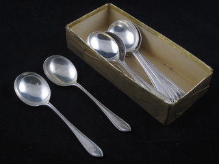 A set of 12 silver soup spoons, London 1933, 22 ozs