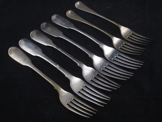 2 George III silver fiddle pattern table forks, London 1873, 2 ditto 1875, 1 ditto 1811 and 3 other table forks, 10 ozs