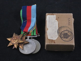 A group of 4 medals to A D M Taylor comprising 1939-45 Star,  Africa Star, Defence & War medal, with original box of issue