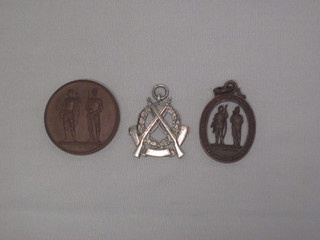A silver shooting medal to Capt. R Morrison Birmingham 1932  and 2 bronze shooting medallions