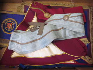 A quantity of Masonic regalia comprising Provincial Grand Officer's full dress apron, collar and gauntlets, Assistant Grand  Director of Ceremonies Essex, Mark Master Masons Provincial  Grand Officer's full dress apron and collar, Sword Bearer -  Middlesex, Royal & Select Master's apron, silver plated Past  Master's collar jewel and collar