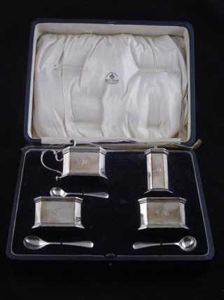 A silver 7 piece condiment set, London 1935 by Mappin & Webb comprising mustard, pair of salts, pepper pot and 3 condiment  spoons, 10 ozs, 1 blue glass liner f and r, cased   ILLUSTRATED