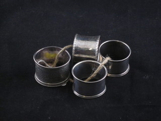 4 various silver napkin rings 2 ozs