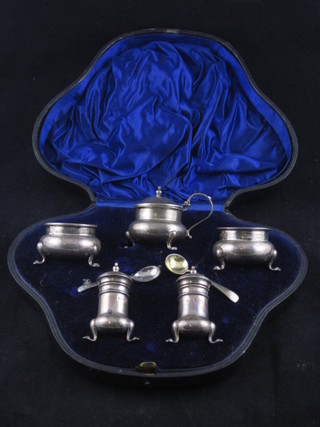 An Edwardian silver 5 piece condiment set comprising mustard, pair of salts, pair of peppers, Birmingham 1909 and 1914, 4 ozs,  cased  ILLUSTRATED