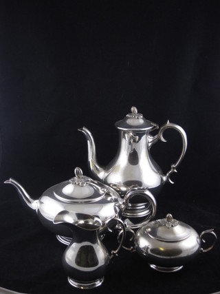 A silver plated 4 piece tea/coffee service comprising tea pot, coffee pot, twin handled sugar bowl and cream jug