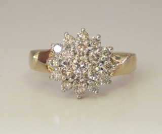 A lady's 9ct yellow gold cluster ring set diamonds