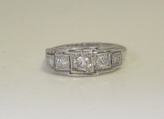 An 18ct white gold dress/engagement ring set 5 diamonds,  approx 0.55ct