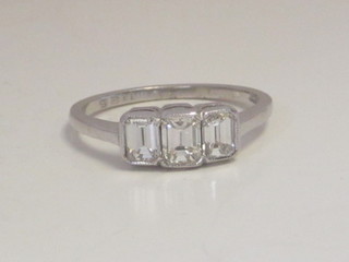 An 18ct white gold dress/engagement ring 3 Princess cut  diamonds, approx 1.45ct
