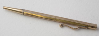 A 9ct gold cased propelling pencil