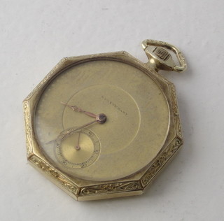 An octagonal open faced dress pocket watch contained in a gilt metal case marked Stuyvesant