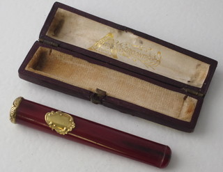 A cheroot holder with gilt metal mounts