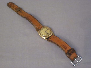 A gentleman's wristwatch contained in a gold case