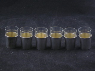 6 Austrian glass shot glass contained in a white metal frames