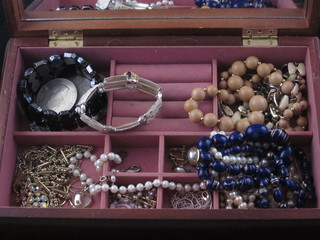 A quantity of costume jewellery contained in jewellery box
