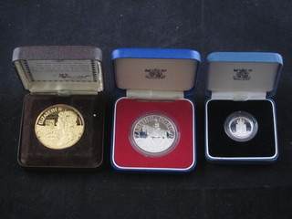 A 1977 silver proof crown, 1 other 1977 Silver Jubilee crown and a 1988 silver proof 