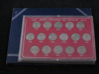 A collection of silver threepences and a set of George VI shillings  and sixpences 1937-52