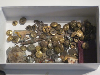 A collection of various military buttons