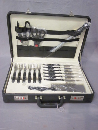 A 24 piece Cosmic Chef's knife set, contained in an attache case