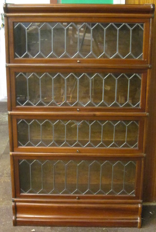 A mahogany 4 section Globe Wernicke bookcase enclosed by  lead glazed panelled doors 34"