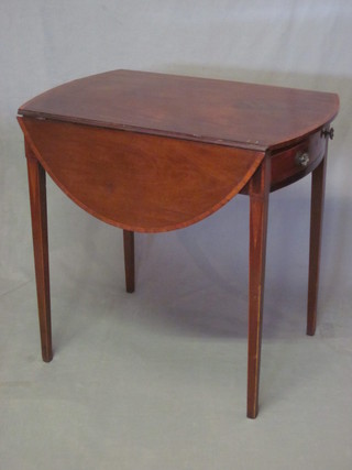 A mahogany oval Pembroke table with crossbanded top, fitted a  drawer and raised on square tapering supports 29"