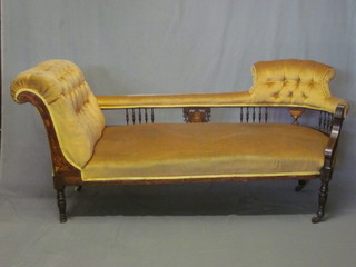 A Victorian inlaid rosewood sofa upholstered in yellow material  and with bobbin turned decoration, raised on turned supports 69"