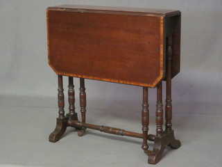 An Edwardian inlaid mahogany Sutherland table, raised on  turned supports 21"