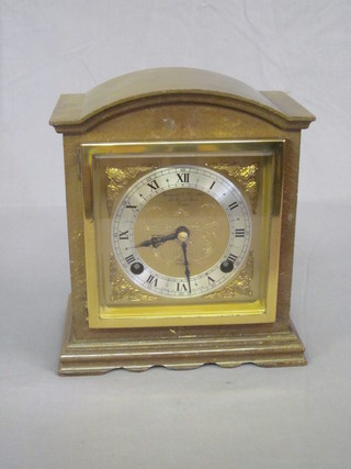An Elliott striking bracket clock, the 5" square brass dial with silvered chapter ring and marked Garrard & Company