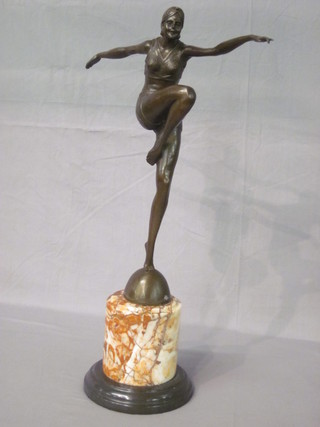 An Art Deco style figure of a bronze dancing girl, raised on  a marble base 23"