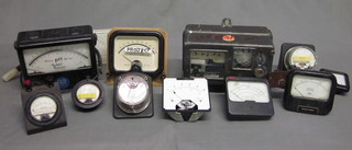 A box containing a coin operated electric meter and a collection  of assorted metric meters