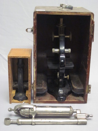 A Barker microscope no. 13363 contained in a wooden box  brass, a small microscope and a nickel pump