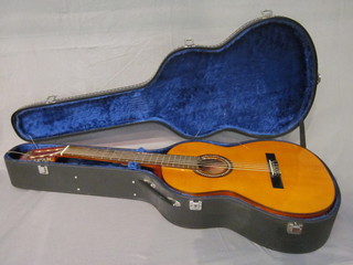 A Spanish guitar labelled Vicente Sanchis