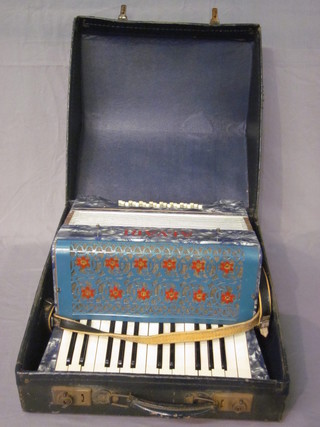An accordion by Lavari with 24 buttons