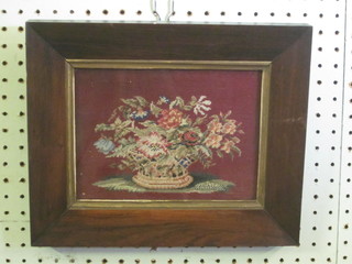 A Victorian Berlin woolwork panel of a vase of flowers 6" x 8" contained in a rosewood frame