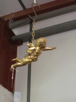 A gilt spelter figure of a flying cherub 9"