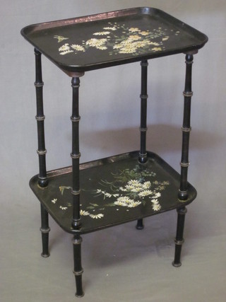 A Victorian papier mache rectangular 2 tier etagere raised on ebonised bamboo finished supports 16"